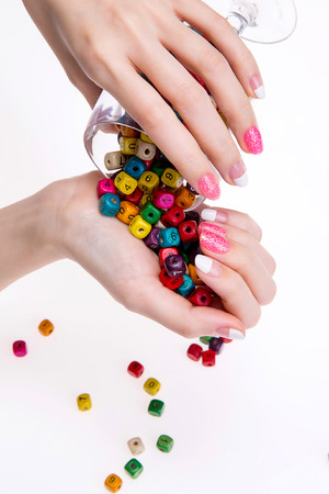 a woman's nail, designed with nail artの写真素材