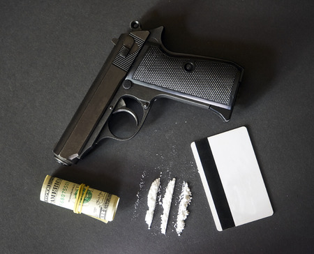 Gun, drugs and moneyの写真素材