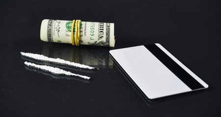 Gun, drugs and moneyの写真素材