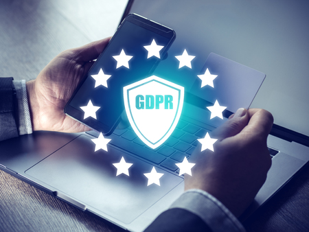 GDPR Concept, Businesspeople hand holding digital smartphone sign, general data protection regulation and key icon, Cyber ??security and information privacy, 25 may 2018.の写真素材