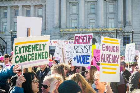 January 20, 2018 San Francisco / CA / USA - Various raised signs at the Women's March rally taking place in the Civil Center Plaza, in front of the City Hallのeditorial素材