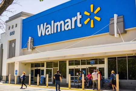 Mountain View / CA/ USA - People going in and coming out of a Walmart store on a sunny day, south San Francisco bay areaのeditorial素材