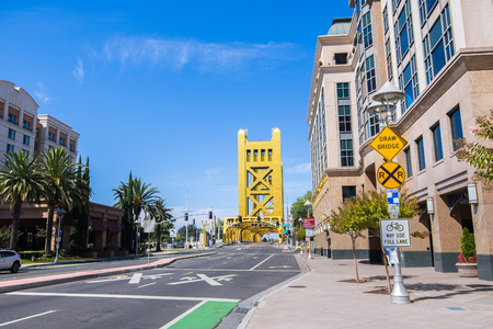 Urban landscape in downtown Sacramento; the Tower Bridge visible in the background; Californiaの写真素材