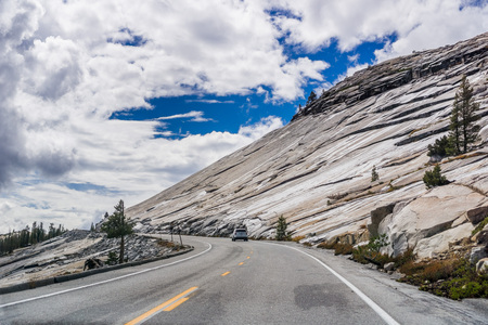 Travelling through Yosemite National Park on a cloudy day, Californiaの写真素材