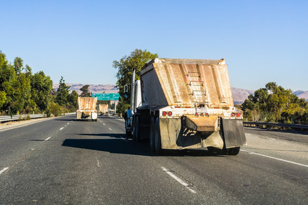 Truck transporting raw materials to be used in construction, San Francisco bay area, Californiaの写真素材