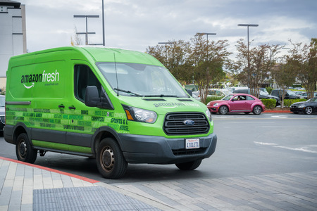 November 8, 2017 San Jose/CA/USA - Amazon Fresh van making deliveries in San Francisco bay areaのeditorial素材