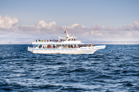 November 22, 2018 Monterey / CA / USA - Whale watching cruise ship in Monterey bay, Pacific Ocean coast, Californiaのeditorial素材
