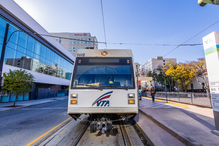November 25, 2018 San Jose / CA / USA - VTA Train crossing through downtown San Jose; VTA Light Rail is a system serving part of south San Francisco bay areaのeditorial素材