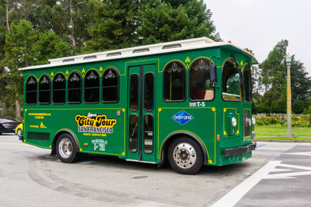 July 20, 2018 San Francisco / CA / USA - Vintage looking San Francisco City Green Tour Bus crossing Golden Gate Parkのeditorial素材