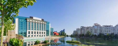 September 18, 2017 Bucharest/Romania - The modern National Library of Romania on the shoreline of Dambovita River on a sunny clear dayのeditorial素材
