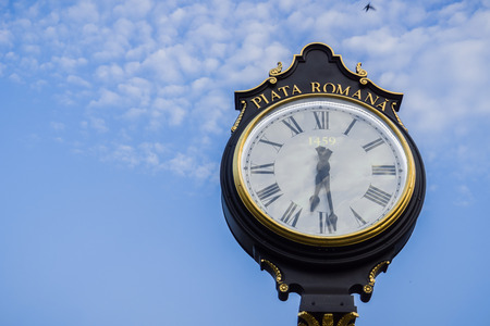 Public clock in Romana square commemorating the year when the city was first set up, Bucharest, Romaniaの写真素材
