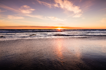 Sunset view of Malibu beach, the Pacific Ocean coastline, Los Angeles county, Californiaの写真素材
