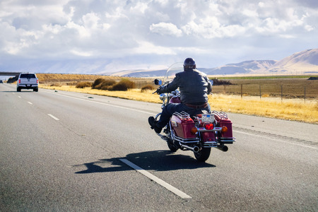 December 2, 2018 Los Angeles / CA / USA - Biker riding a Harley Davidson motorcycle on the interstate;のeditorial素材