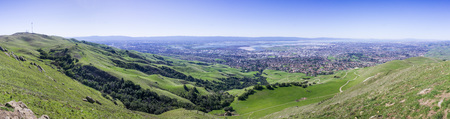 Panoramic view the green hills of south San Francisco bay from Mission peak; Monument Peak on the left; San Jose, Milpitas, Fremont and Newark in the background; Californiaの写真素材