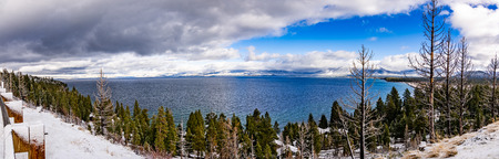 Panoramic view of Lake Tahoe on a stormy day, Sierra mountains, Californiaの写真素材