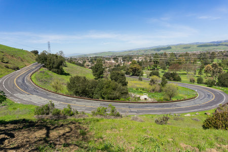 Winding paved road in Santa Teresa park, San Jose, Santa Clara county, California