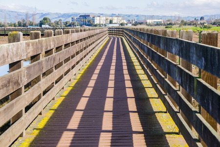 Wooden bridge in Don Edwards wildlife refuge, Fremont, San Francisco bay area, Californiaの写真素材