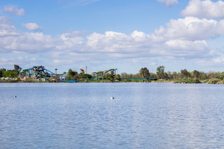 Water slide on the shoreline of a pond, Cunningham Lake, San Jose, south San Francisco bay, Californiaの写真素材