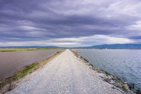 Storm clouds gather above the San Francisco bay, Sunnyvale, Californiaの写真素材