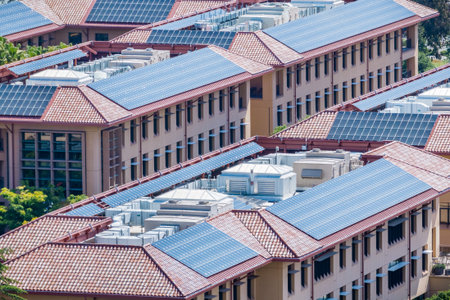 Solar panels installed on the tiled rooftops of buildings, San Francisco bay area, Silicon Valley,...