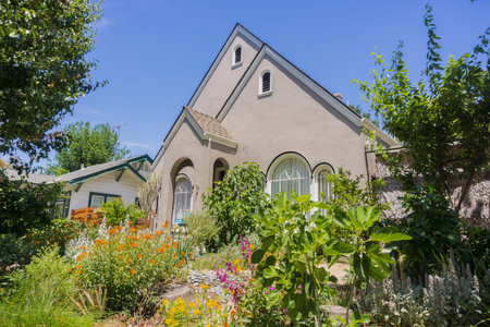 Lush garden in front of a house in a residential neighborhood, San Jose, California