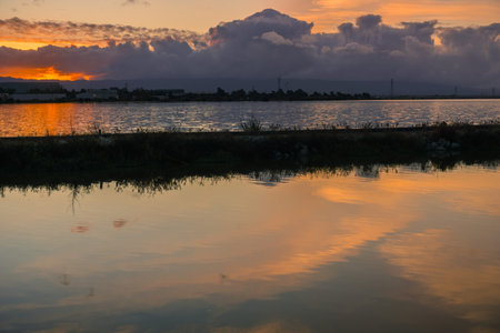 Levee and ponds in south San Francisco bay at sunset, Sunnyvale, California