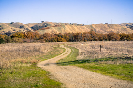Walking path through grassland, Sycamore Grove Park, Livermore, east San Francisco bay, Californiaの写真素材