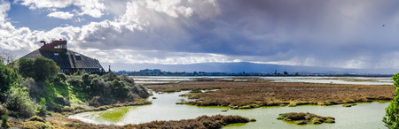 Storm approaching Don Edwards National Wildlife Refuge, Alviso marsh, San Jose, south San Francisco bay, Californiaの写真素材