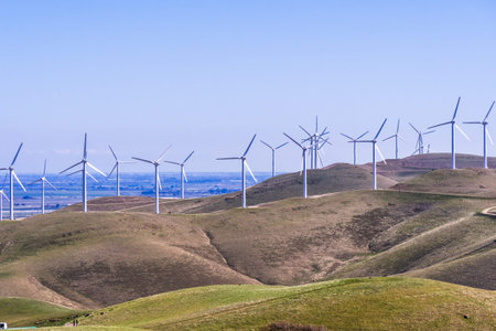 Wind turbines on the hills of east San Francisco bay, Stockton valley in the background, Alameda...