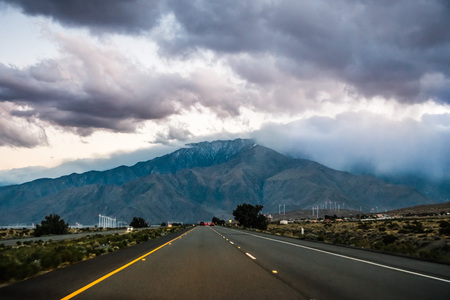 Travelling at sunset towards Mt San Jacinto, Coachella Valley, Californiaの写真素材