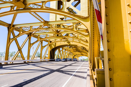 Cars driving on the Tower Bridge in Sacramento, California
