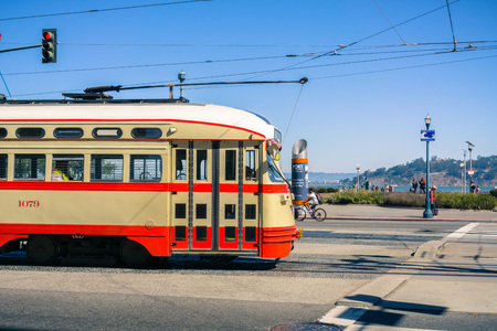 October 7, 2017 San Francisco/CA/USA - Old looking tramway passing by near the Ferry Buildingのeditorial素材