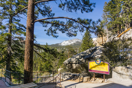 March 17,2017 Palm Springs/CA/USA - Entrance to Mount San Jacinto state park; snow covered mountains in the backgroundのeditorial素材