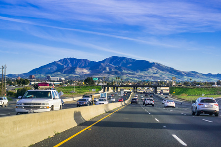 January 28, 2018 Concord / CA / USA - Evening traffic on a highway in San Francisco bay area; Mt Diablo in the backgroundのeditorial素材