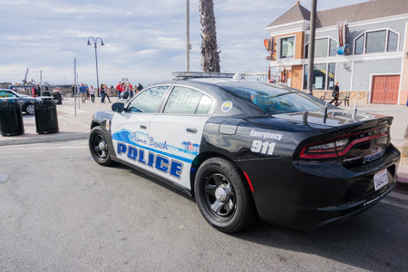 December 24, 2017 Pismo Beach / CA / USA - Custom panted police car parked close to the beachのeditorial素材