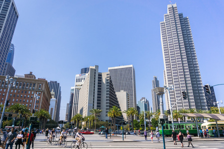 September 5, 2017 San Francisco/CA/USA - People enjoying a sunny, warm day near the Embarcadero; skyscrapers in the backgroundのeditorial素材