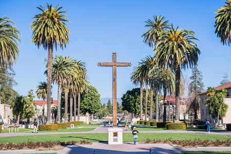 February 17, 2018 Santa Clara / CA / USA - View of the alley in front of Santa Clara Mission, Santa Clara University campus on a sunny winter day, south San Francisco bay areaのeditorial素材