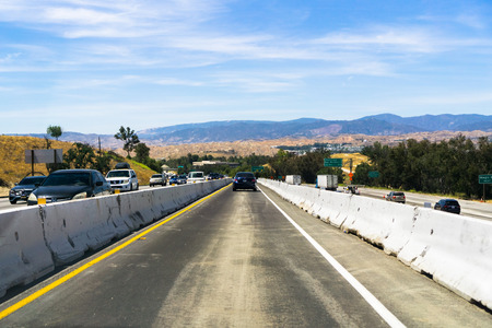 June 10, 2018 Valencia / CA / USA - Driving on a special created lane, divided by cement blocks, during repair and improvement of the interstateのeditorial素材