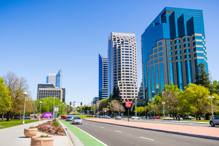 April 14, 2018 Sacramento / CA / USA - Skyscrapers on the Capitol Mall on the sunny day; the Capitol State builsing visible in the backgroundのeditorial素材