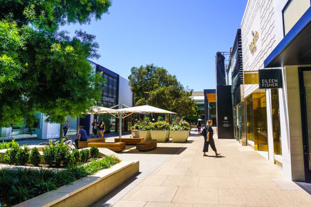 August 2, 2018 Palo Alto / CA / USA - Walking through the open air Stanford shopping center, San...