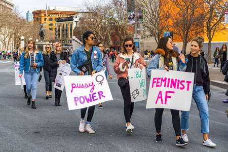 January 19, 2019 San Francisco / CA / USA - Participants to the Women's March event hold signs with various messagesのeditorial素材
