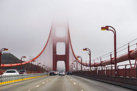 San Francisco, CA/USA July 2, 2016 - Golden Gate Bridge engulfed by fog and clouds, San Francisco