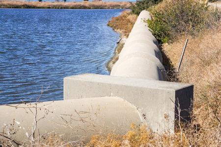 Cement pipe, near the Sunnyvale Water Pollution Control Plant, San Francisco Bay Area, Sunnyvale, Californiaの写真素材