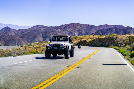 March 17, 2019 Coachella Valley / CA / USA - Jeep vehicle travelling on a highway in south Californiaのeditorial素材