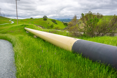 Gas pipeline crossing the hills, south San Francisco bay, San Jose, Californiaの写真素材