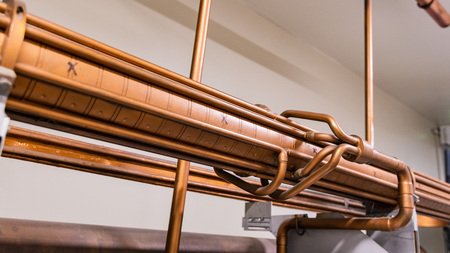 June 21, 2019 Menlo Park / CA / USA - SLAC National Accelerator Laboratory's "Klystron Gallery" visitor display of an unused part of the underground beam line build out of copperのeditorial素材