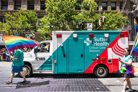 June 30, 2019 San Francisco / CA / USA - Sutter Health party taking part at the SF Pride Parade on Market Street in downtown San Franciscoのeditorial素材