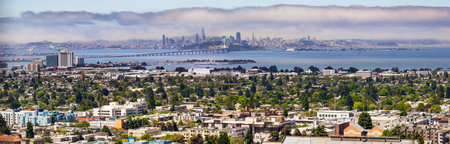 Panoramic view of Berkeley; San Francisco, Treasure Island and the Bay bridge visible in the...
