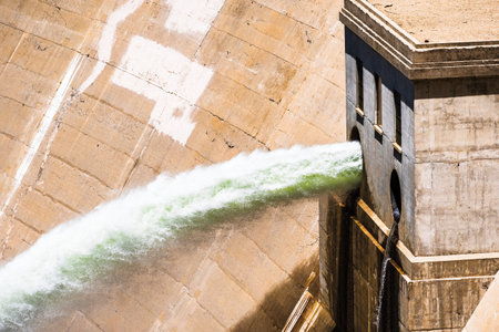 Close up of water jets released at O'Shaughnessy Dam from Hetch Hetchy Reservoir in Yosemite...