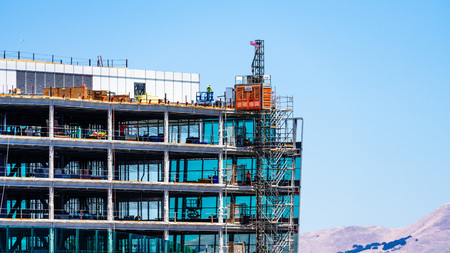July 19, 2019 Sunnyvale / CA / USA - Detail of modern office building under construction; visible steel frame and metal stairs; Silicon Valley, South San Francisco bay areaのeditorial素材
